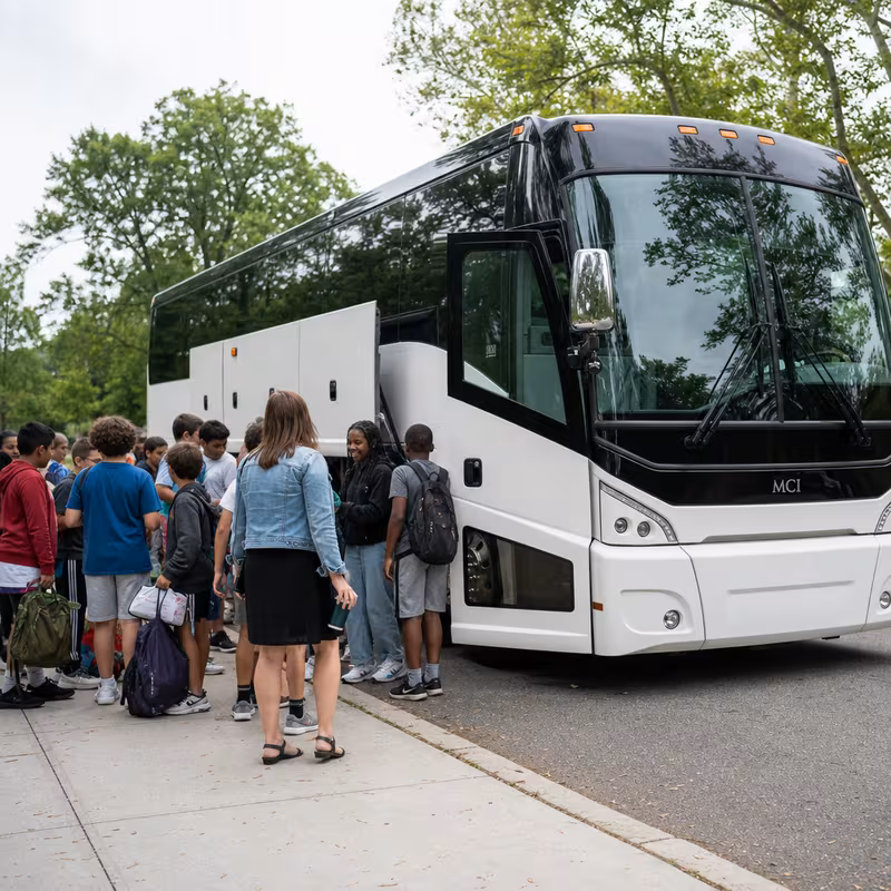 Black Mercedes Sprinter van staged for an St Louis School Transportation group