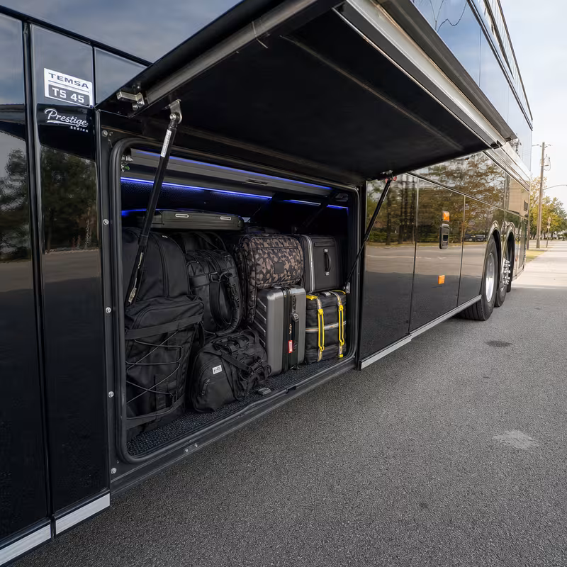 Party bus interior with wraparound leather seating and LED lighting in St Louis